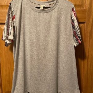 Women’s tee with sequined sleeves